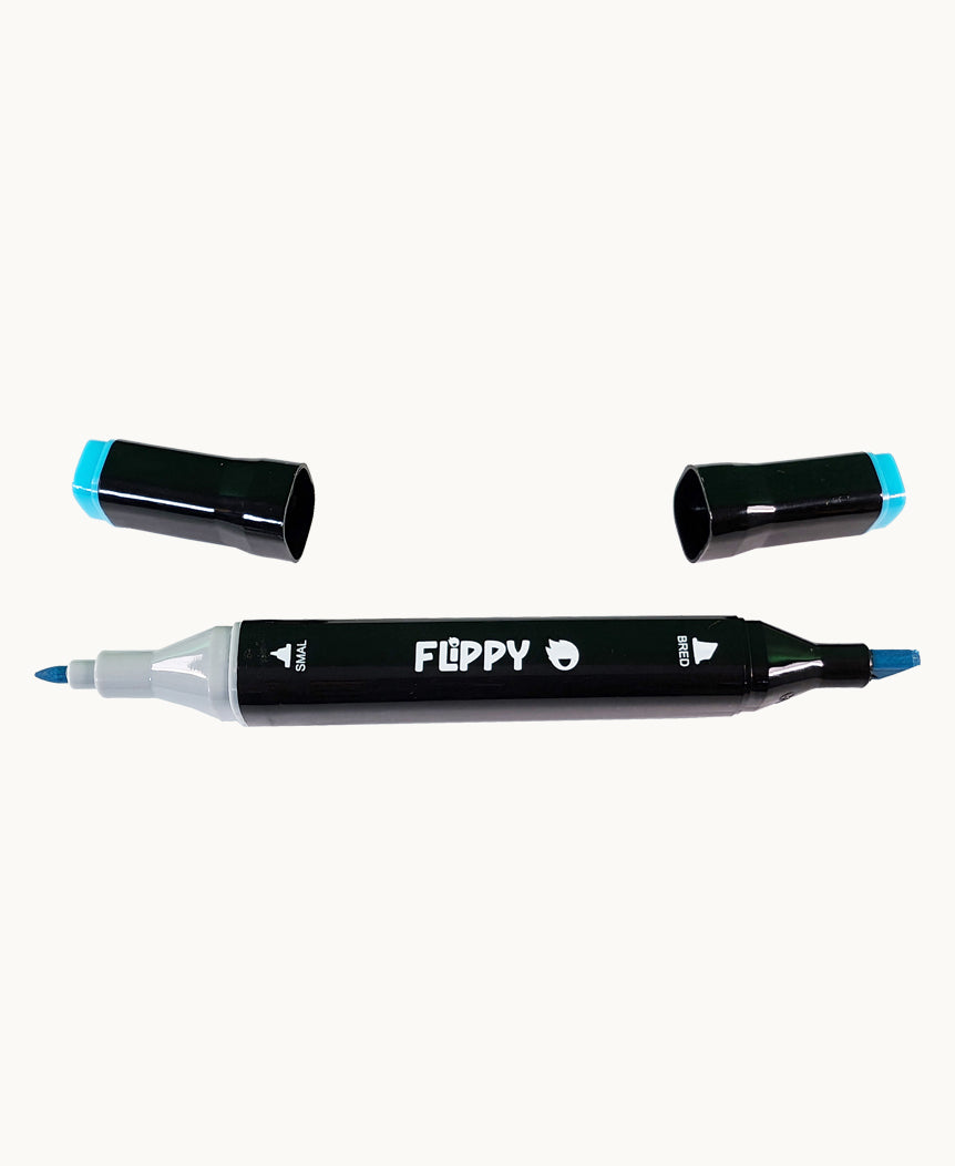 Penna från Stora Paketet – dubbelsidig Flippy-penna med fin- och bred spets, perfekt för både detaljer och färgfyllning.